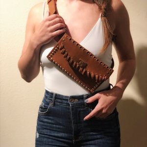 BROWN BELTED PURSE WITH FRINGE